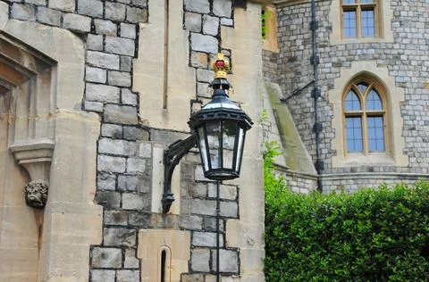 An ancient street lamp with a crown pattern Stock Photos