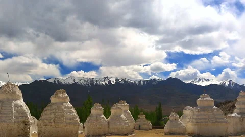 Ancient stupas on the background of cloudy sky and mountains Stock Footage 41751135