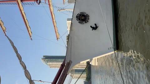Ancient style ship model moored along the Chao Phraya River, vertical video. Stock Footage 270153106