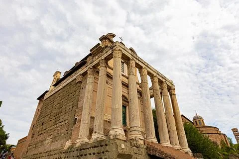 Ancient temple columns and massive stone wall in the Roman Forum, Rome, Italy Stock Photos