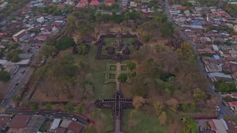 Ancient temple complex at golden hour in Phimai Historical Park Stock Footage 306758301