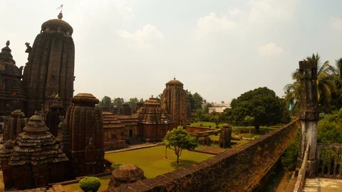 Ancient temple complex Lingaraj southern indian style green garden Bhubaneswar Stock Footage 106117851