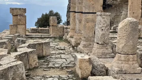 Ancient Temple Floor Leading to Decorated Columns Alahan Monastery, Turkey Stock Footage 306880693