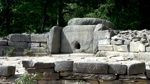 Ancient temple or funeral structure. Stone dolmen resembling small house. Stock Footage 134062583