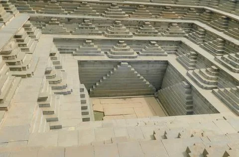 Ancient Temple pool with steps located in the Humpi Vijayanagara civilization Stock Photos