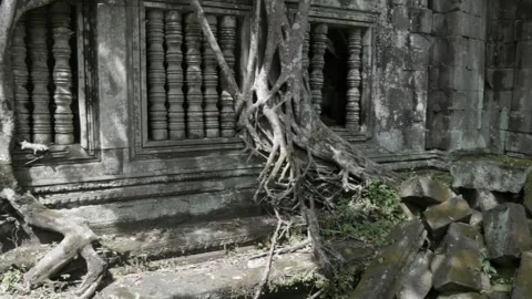 Ancient temple ruins with tree roots, Prasat Beng Mealea, Cambodia Stock Footage 335666393