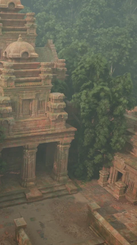 Ancient temple structures stand among green trees in a remote jungle area Video stock 339041999