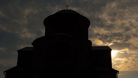Ancient temple at sunset on a cloudy day Stock Footage