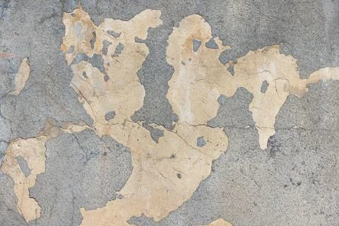 Ancient texture reveals a world map on cracked concrete surface in urban se.. Stock Photos