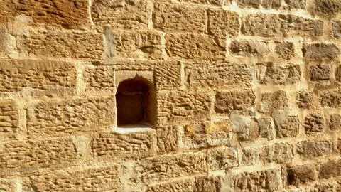 Ancient Textured Stone Wall Featuring Small Arched Architectural Niche Design Stock Photos