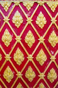 Ancient thai pattern on buddha temple wall Foto stock
