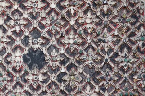 Ancient thai style stucco pattern on temple wall Stock Photos