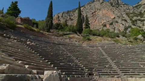 Ancient Theater of Delphi Archaeological Site has many seats bear incised Stock Footage 224493224