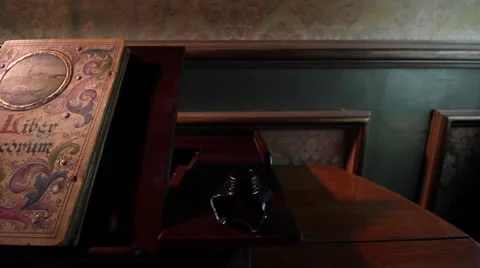 Ancient tome on the desk side dolly camera Stock Footage 58947740