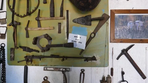 Ancient tools of the mason and other useful utensils on the farm (panning) Stock Footage 113937238