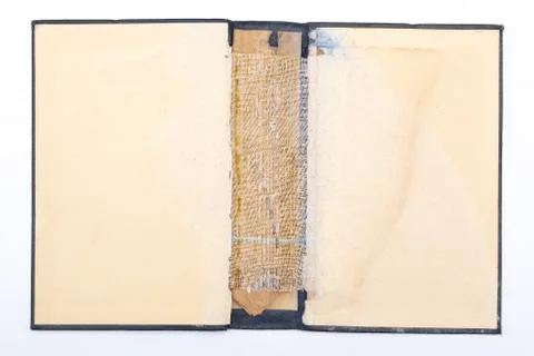 Ancient torn book Stock Photos