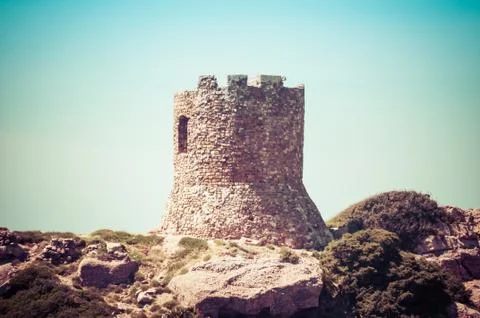 Ancient tower on the coast Stock Photos