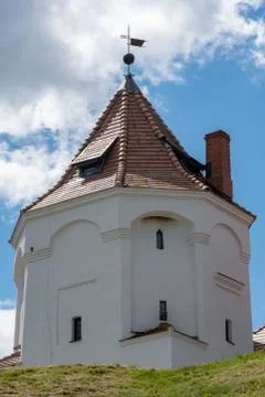 The ancient tower of the Mir castle in the background of the cloudy sky 스톡 사진