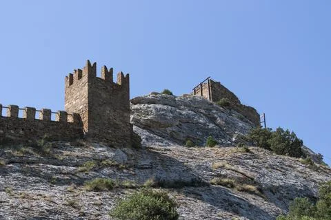 An ancient tower on a rock Stock Photos