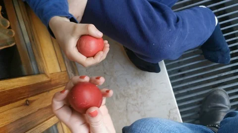 Ancient traditional easter game of reggio emilia with colored boiled eggs Video stock 128801339