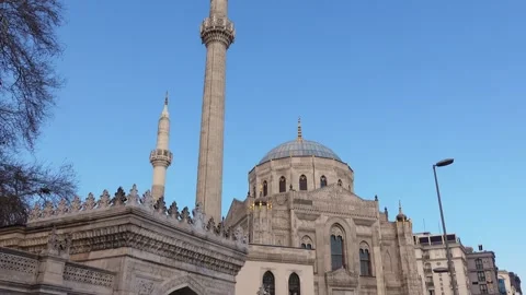 Ancient Turkish mosque with blue dome against sky on sunny day. Tour of Istanbul Stock Footage 245868049