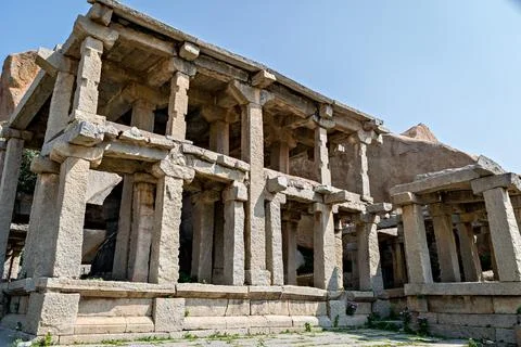 Ancient two storied stone structure for resting of huge monolithic bull in Ha Stock Photos