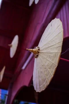 Ancient umbrella in the Thai temple Stock Photos