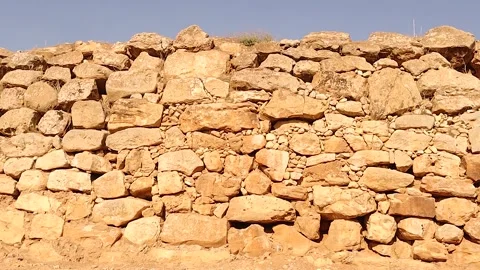 Ancient wall built with massive stones in Akhtarin countryside, Aleppo, Syria Stock Footage 312673435