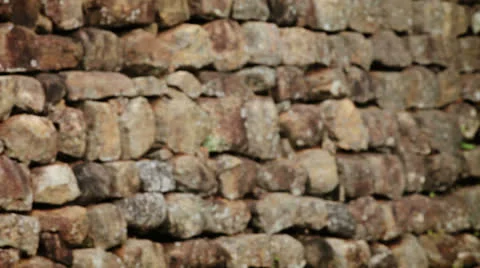 Ancient wall of rough stone. hd video Video stock 23441701