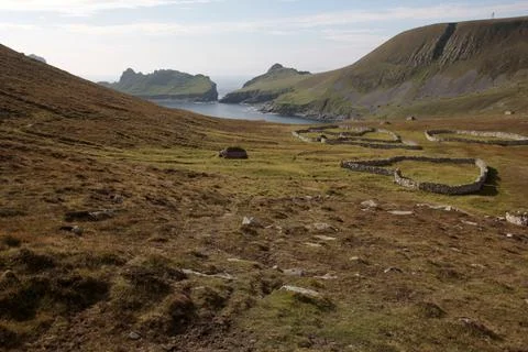Ancient wall structures and shelters, i.e. cleits, on the remote archipelago  Stock Photos