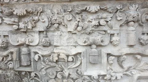 The ancient wall of the temple with ornament Stock Photos