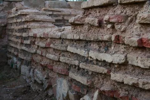 Ancient walls in the ground. Stock Photos