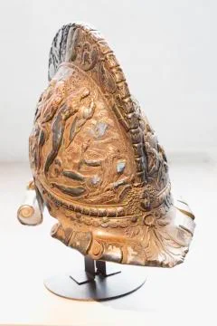 Ancient war helmet in exposition Stock Photos