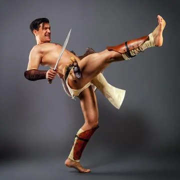 Ancient warrior.  kick. Stock-Fotos