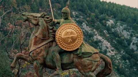Ancient warrior statue on horseback with golden shield capturing historical.. Stock Footage 339652284