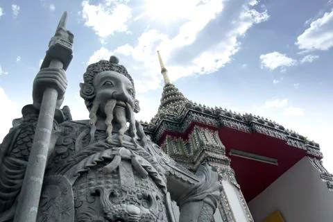 Ancient warrior statue is stand alone at temple in Bangkok, Wat Pho in Thailand. Stock Photos