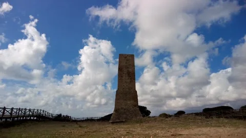 Ancient watchtower called Torre Ladrones in the dunes of Artola, Marbella. Stock Footage 287988843