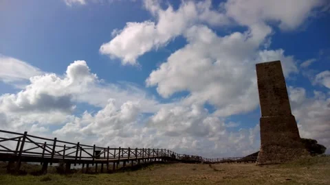 Ancient watchtower called Torre Ladrones in the dunes of Artola, Marbella. Stock Footage 287988916