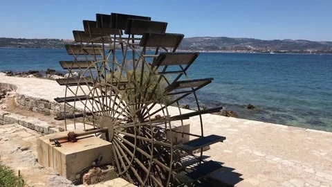 An ancient water mill turning in Katavothres, Cephalonia or Kefalonia in Greece. Stock-Footage 79856487