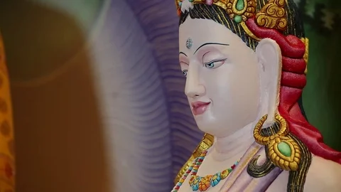 Ancient white buddhist statue - Buddha - tilt Stock Footage 79834751