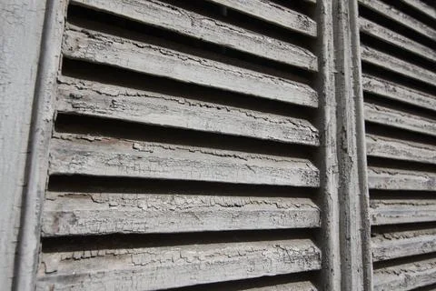  ancient window in red block wall Stockfoto's