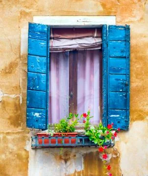 Ancient window with shutters Stock Photos