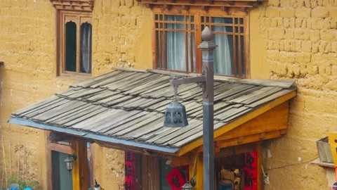 Ancient Wooden Townscape in Falling Snow — Quiet Moment in Chinese Heritage Stock Footage 312584540