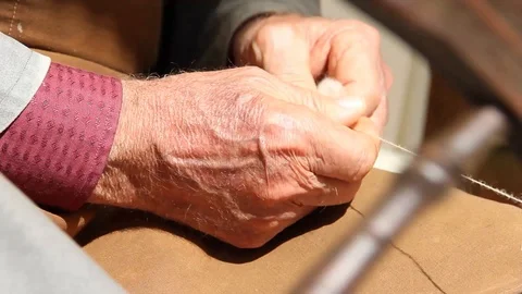 Ancient works. wool processing. hands of craftsman Stock Footage 126091515