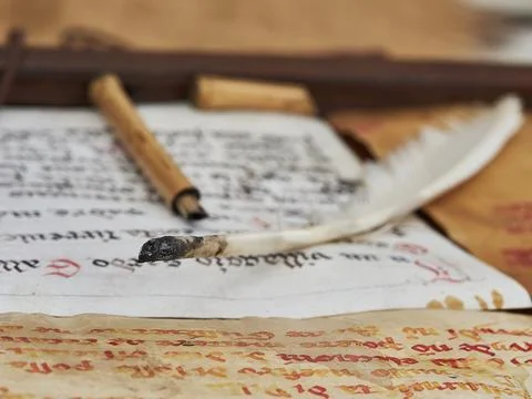 An ancient written scroll of parchment Stock Photos