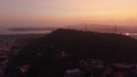 Ancon Hill and Panama Flag at Sunset in Panama City Establishing Drone Shot Видео 340035064