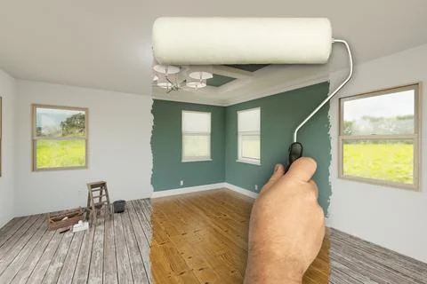 Before and After of Man Using A Paint Roller to Reveal Newly Remodeled Room.. Stock Photos