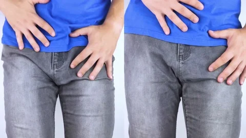 Before and after pain in the bladder. Conceptual shot. On the left, the man grab Stock Footage 161141315