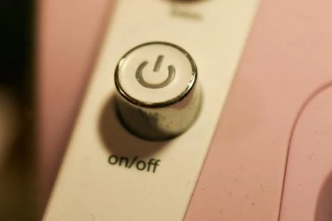 On and off button on the device Stock Photos