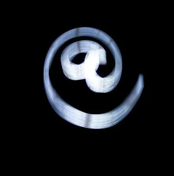 At and e-mail symbol icon using light painting technique Stock-Illustration